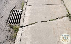 Property Line Markers in NYC Sidewalks Offer Crossing Only By Permission -  Untapped New York